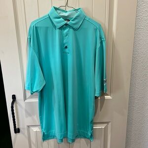 Footjoy mint green golf shirt.  The Tribute logo on left sleeve